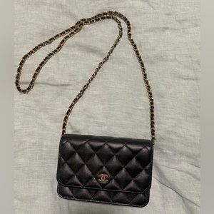 21P CHANEL MINI WALLET ON CHAIN. black caviar leather with burgundy interior.